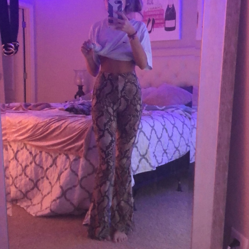 snake print flared legged bottems